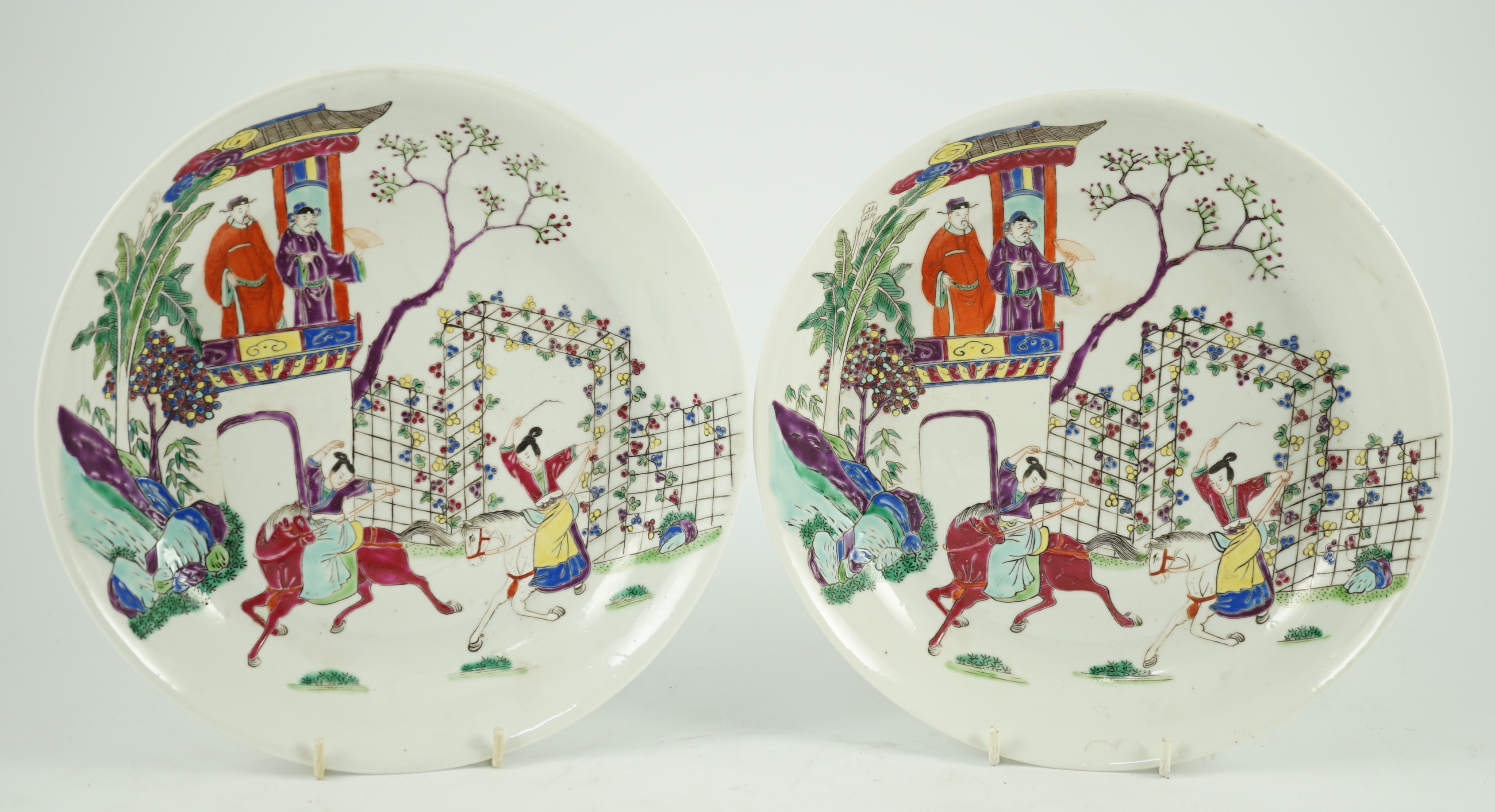 Two Chinese famille rose fencai saucer dishes, Yongzheng marks but 19th century, 23.7cm diameter